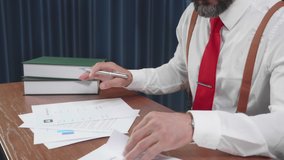 Senior business man working and looking report of chart financial on desk at home, businessman having stress and fail at office, male is exhaustion, employee is problem and deadline while overworked. - Powered by Shutterstock - Get 15% off with code: PIKWIZARD15