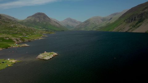 4K:  Drone Aerial Clip of Wastwater Lake in the English Lake District, Cumbria, UK. Circular shot in Summer with Blue Sky. Stock Video Clip Footage