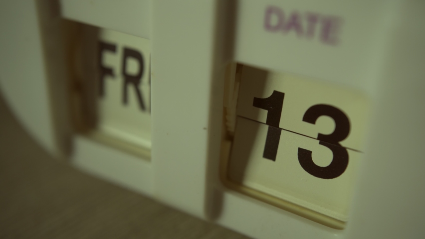 The clock showing Friday the 13th date | Shutterstock HD Video #1061385643