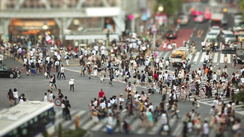 The famous Shibuya Crossing in Tokyo Japan with it's crowds of people, shot with a tilt-shift lens