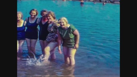 SANREMO, ITALY JULY 1966: Bathers at the sea in Sanremo