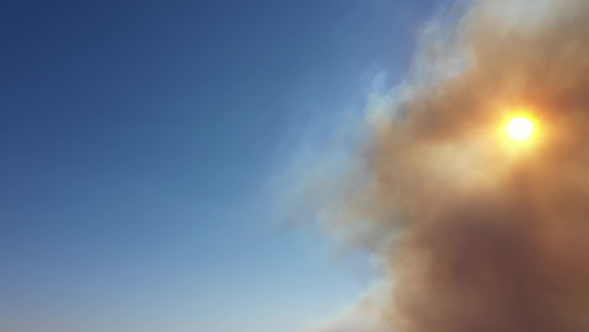Aerial pan of California Wildfire Smoke Covering the Sun During the Silverado Fire_01