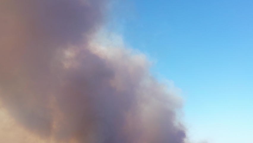 Aerial pan Down of California Wildfire Smoke Covering Middle class Neighborhoods During the Silverado Fire_01
