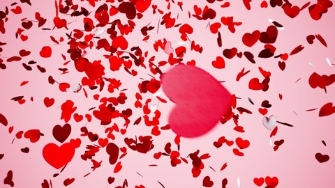 Beautiful animation of red heart-shaped confetti explosion. Cute romantic birthday decorations. Celebration of St.Valentin's day. Decorative shiny party elements are falling down. Fun wedding surprise