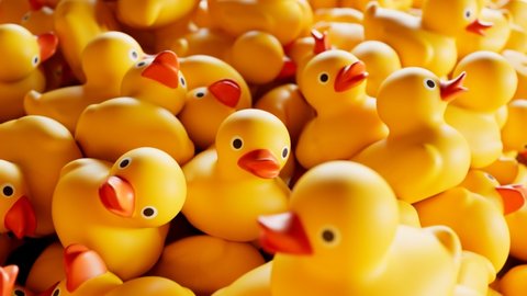 Seamless looping animation of the pile of rubber ducks. A huge amount of cute yellow toys forming stacks. Symbol of play in the water while bathing. Plastic ducklings ready for child's fun in the bath