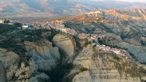 view of Aliano, a town in the province of Matera, in the Southern Italian region of Basilicata, Italy. Famous for the typical calanchi landscape. Aerial view