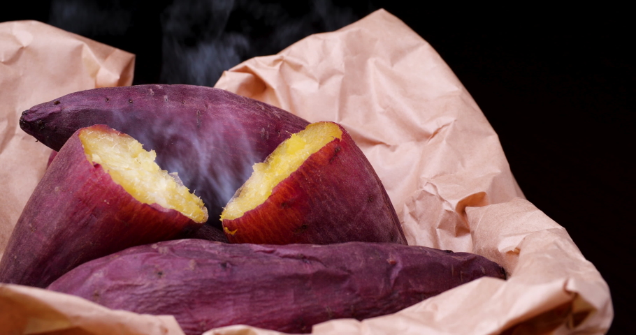 Videotaping a Baked sweet potato while slowly turning it. | Shutterstock HD Video #1061420605