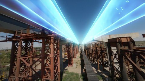 Futuristic glowing projection of bridge and roadway on site with workers in countryside