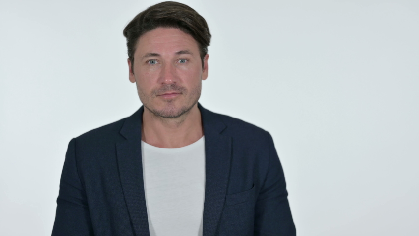 Businessman Pointing at Product with Finger, White Background