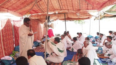 Pilgrim take a rest in tent at Arafah while waiting for wukuf. Wukuf is a day when a pilgrims spiritual, mental and physical states are tested to the fullest.  Mecca, Saudi Arabia, September 14, 2014