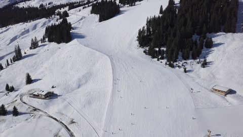 Aerial view of skiers on ski slopes Saalbach-Hinterglemm, Salzburger Land of Austria.