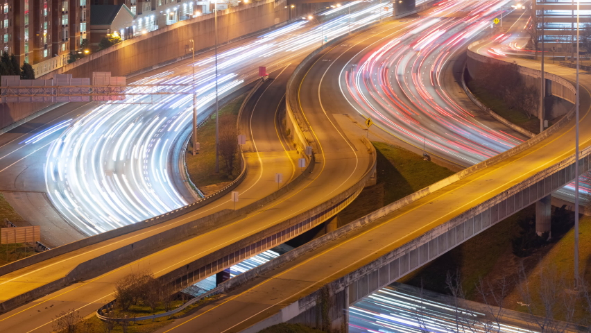 Time Lapse traffic on the I-75 - I-85 freeway at night as it goes through Downtown Atlanta