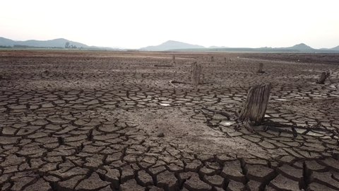 Global warming concept . Dry cracks in the land, serious water shortages. Drought concept.