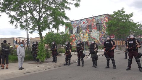 Minneapolis, Minnesota 5/30/20 Police line up to block access to the 12th Precinct Police station which had been taken over by protestors the night before during riots. (5.30.20 is correct date)