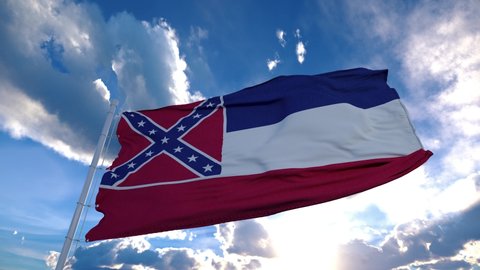 Mississippi flag on a flagpole waving in the wind, blue sky background. 4K