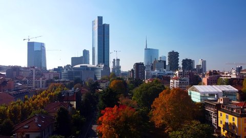 Aerial view of Milan city skyline.  the modern urban landscape of business buildings. Aerial footage showing new skyscrapers. POV. Palazzo Regione Lombardia. Milan Italy 30/10/2020: 