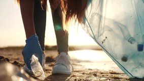 volunteer collecting trash a teamwork. group people on collects garbage plastic trash waste bottles. ecology environmental people pollution teamwork volunteer awareness trash - Powered by Shutterstock - Get 15% off with code: PIKWIZARD15