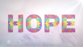 Digital animation of multicolor jigsaw puzzle pieces forming Hope text against white background. Autism Awareness concept. - Powered by Shutterstock - Get 15% off with code: PIKWIZARD15