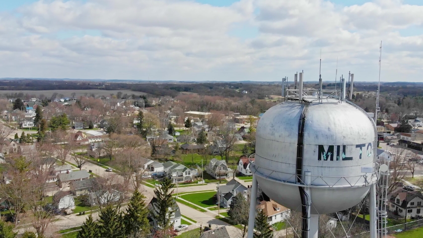 Water Tower in Rural City of Milton, Wisconsin. Aerial Drone Orbiting View