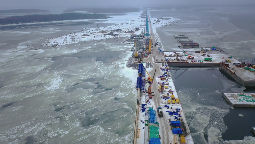 Aerial view of the oil terminal for shipping. Construction of the Russian oil pipe Nord Stream 2 . Export of petrochemical products. Oil flow from russia to germany along the bottom of the baltic sea Royalty-Free Stock Footage #1061488285