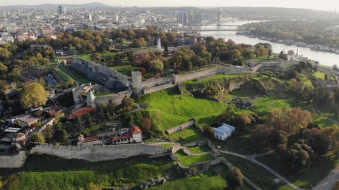 Drone video of Kalemegdan fortress, a medieval stone structure and one of the most important landmarks of Belgrade, Serbia. Aerial view, city skyline. 