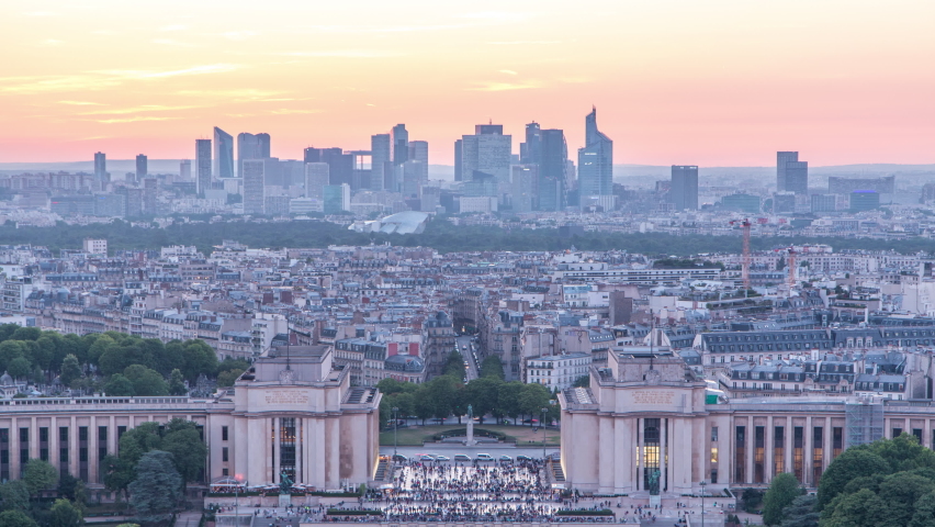Aerial view over Trocadero day to night transition timelapse with the Palais de Chaillot seen from the Eiffel Tower in Paris, France. Top view from observation deck with modern skyscrapers at summer | Shutterstock HD Video #1061492545