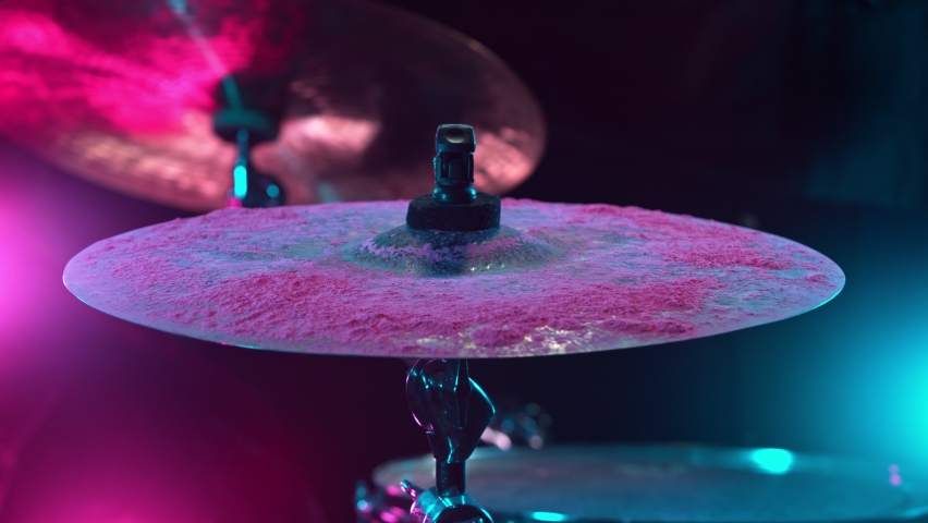 Super Slow Motion Shot of Cymbal Hit with Color Powder Explosion at 1000 fps. Royalty-Free Stock Footage #1061502184