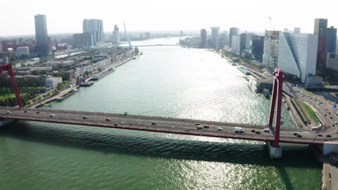 Rotterdam Willemsbrug bridge drone Rotterdam city skyline at day. 