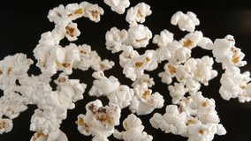 Popcorn Flying on the Black Background. Shot in 1000fps with High Speed Camera, Phantom Flex 4K. - Powered by Shutterstock - Get 15% off with code: PIKWIZARD15