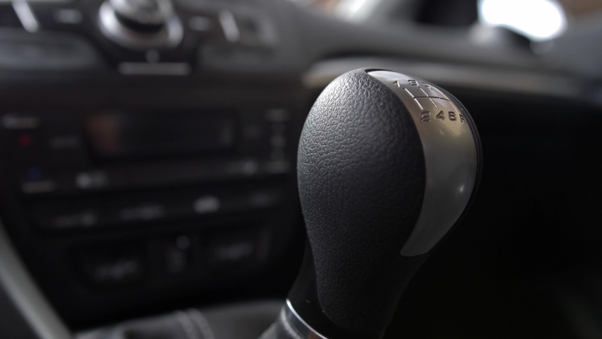 Driver Changing Gears with Manual Transmission Gear Stick | Shutterstock HD Video #1061532028
