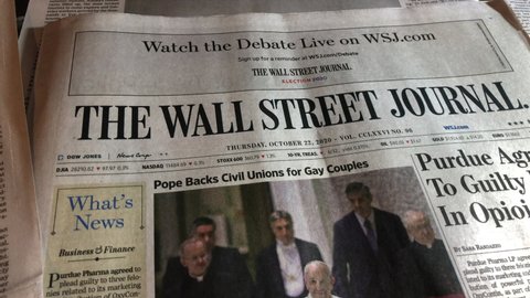 New York, New York United States - October 22 2020: Newspaper coverage of the Pope's support for Civil Unions for Gay Couples. Wall Street Journal, NY Times. 