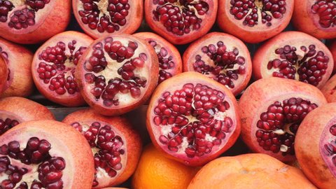 Ripe and juicy half of pomegranates ready for making juice in Istanbul, Turkey