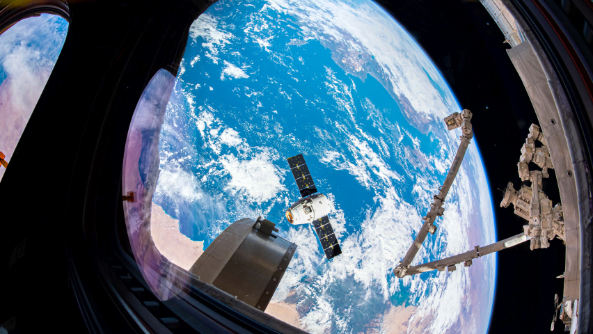 Beautiful time lapse of over the Earth from International Space Station ISS behind a dusty window over Egypt to Russia. Earth maps and images courtesy by Nasa. Pan down motion. Prores 4K