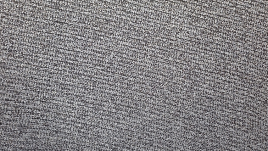woven fabric texture in stop motion. abstract retro design background.