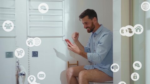Happy businessman use phone sitting on the toilet smiling mobile restroom. Vlogger influencer around social media, app icons animation loud with white interface. Slow motion