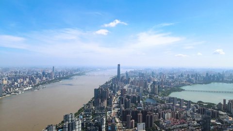 4K Aerial view of Wuhan skyline and Yangtze river with supertall skyscraper under construction in Wuhan Hubei China.