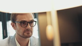 Male eyes in eyeglasses in front of laptop. Coder, programmer or developer using laptop. Close up of glasses - Powered by Shutterstock - Get 15% off with code: PIKWIZARD15