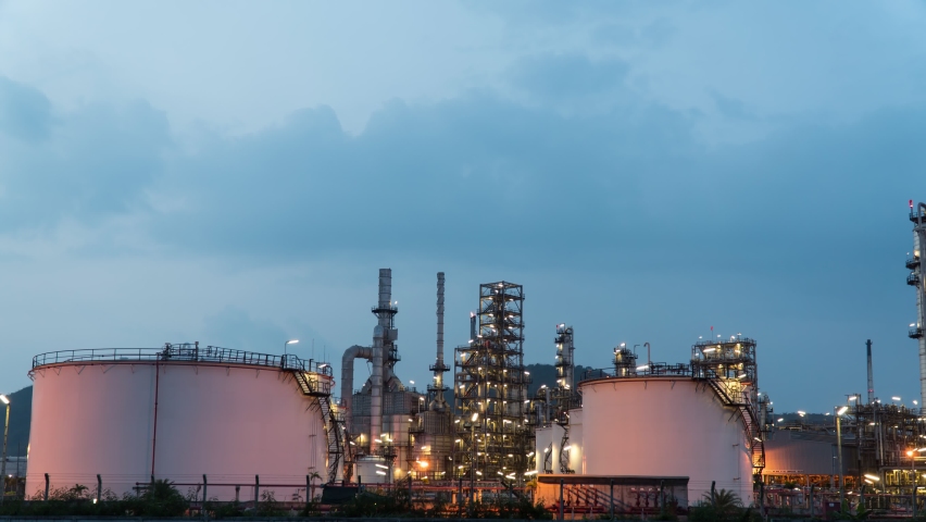 Timelapse manufacturing oil refinery terminal is industrial facility for storage of oil petrochemical. Business Industrial and energy. Oil refinery timelapse. Time lapse gas plant Day to Night b roll. Royalty-Free Stock Footage #1061591065