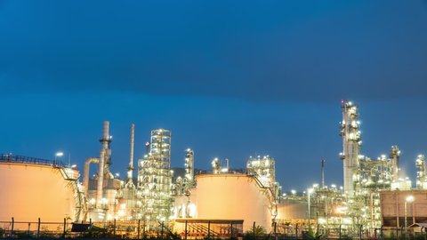 Timelapse manufacturing oil refinery terminal is industrial facility for storage of oil petrochemical. Business Industrial and energy. Oil refinery timelapse. Time lapse gas plant Day to Night b roll.