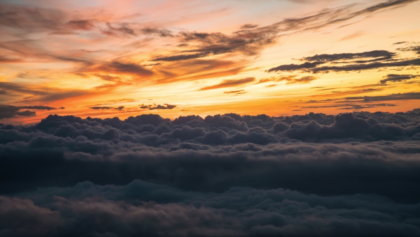 Footage B-roll timelapse foggy or over the clouds while sunrise sky. A sea of fog is formed from stratus. Foggy valley mount ridge nature. Time lapse Beautiful foggy and cloudy slow moving Aerial view Royalty-Free Stock Footage #1061591104