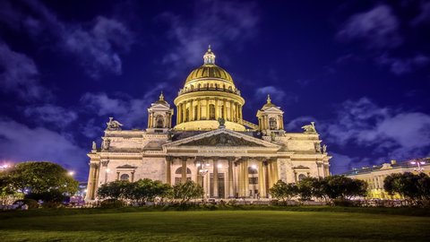 St. petersburg, isaac's cathedral night timelapse. historical building in the light of the lanterns of the night city.