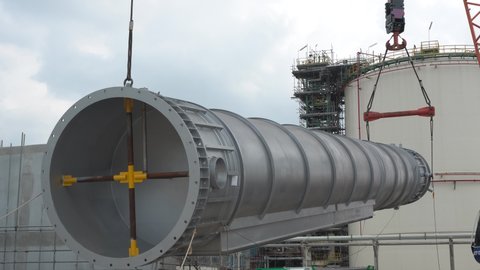 Heat recovery steam generator stack during lifting to installation as part of the Power plant construction.