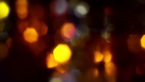 This animated video stock footage demonstrates an elegant multicolored bokeh background made up of many moving bokeh highlights.