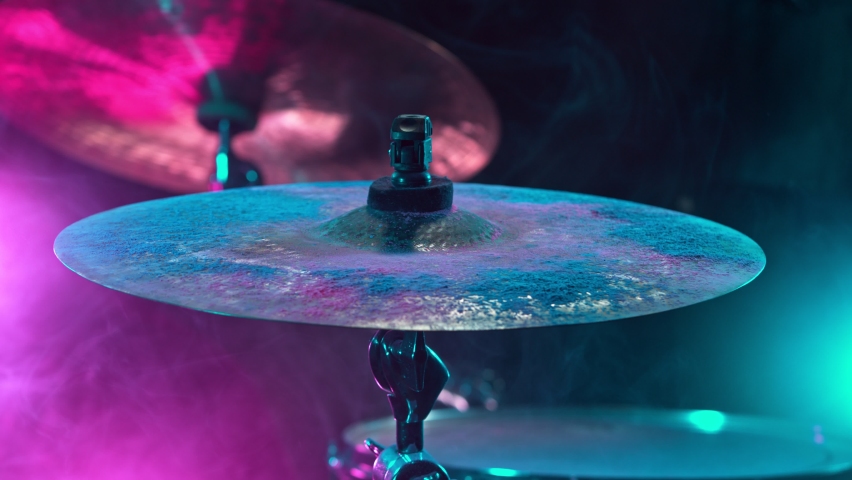 Super Slow Motion Shot of Cymbal Hit with Color Powder Explosion at 1000 fps. Royalty-Free Stock Footage #1061614387