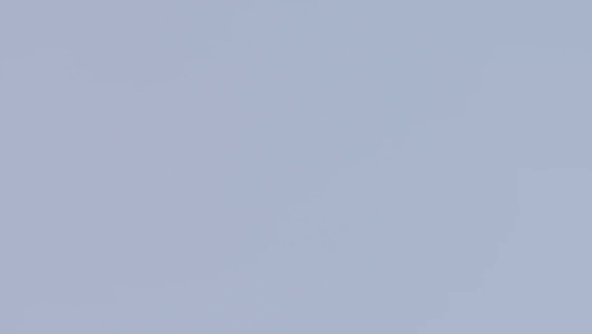 A Cal Fire McDonnell Douglas MD-87 tanker plane flies by to make a large retardant drop on the Silverado Fire in Southern California