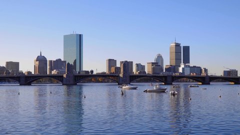 Autumn snow on the Charles River with Boston skyline