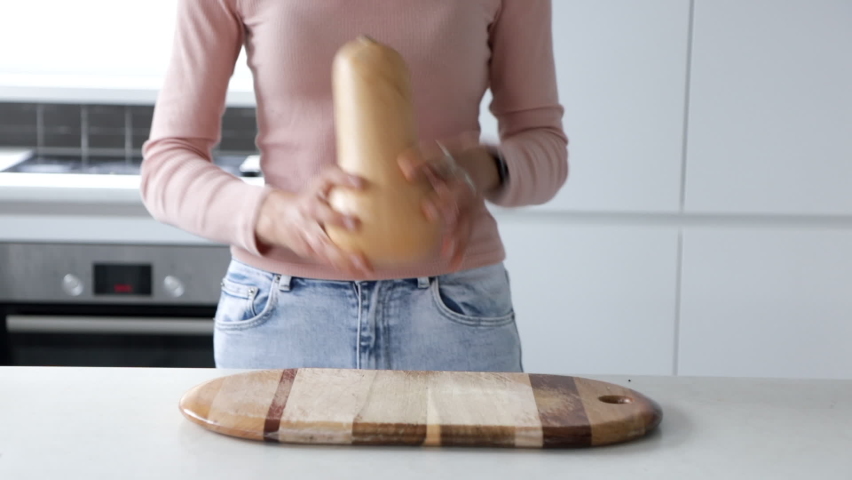 Young slim woman holding raw pumpkin, low carb diet