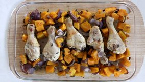 Roasted chicken drumsticks with pumpkin above view, low carb, paleo diet