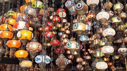 Colorful traditional Istanbul hanging light lamps shop in gold and spice souk in Dubai, Multicolored interior decors with modern and antique designs.