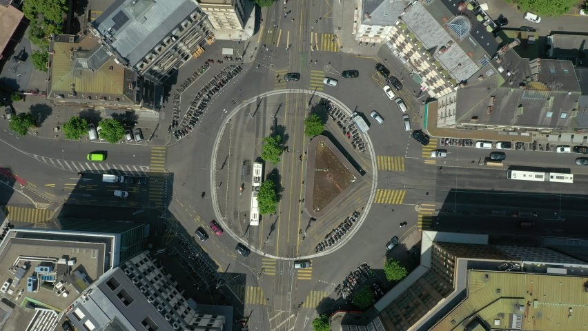 geneva city center traffic street circle sunny day aerial topdown panorama 4k switzerland. Royalty-Free Stock Footage #1061648548
